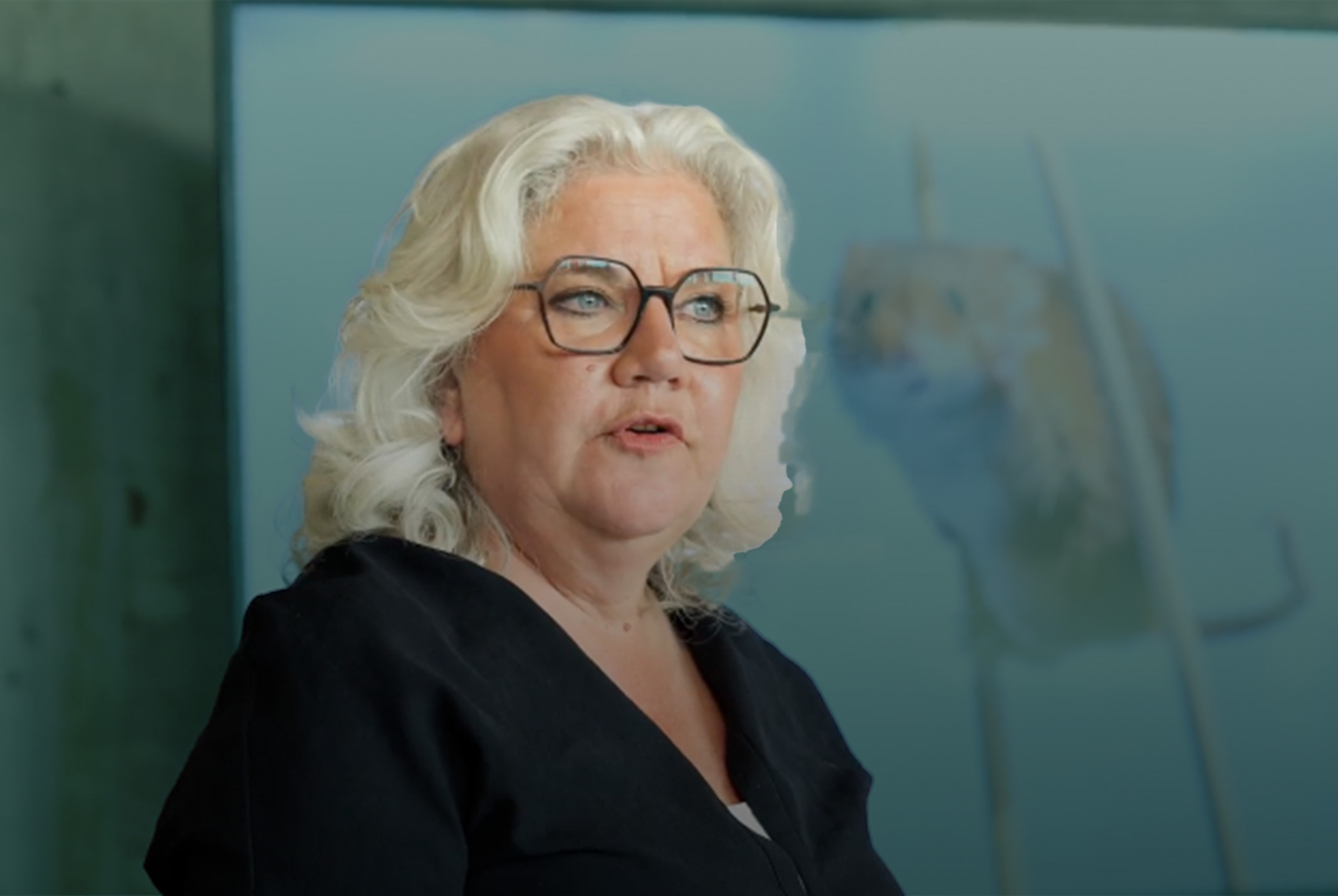 Irene Koel als spreker en vrouwelijke dagvoorzitter