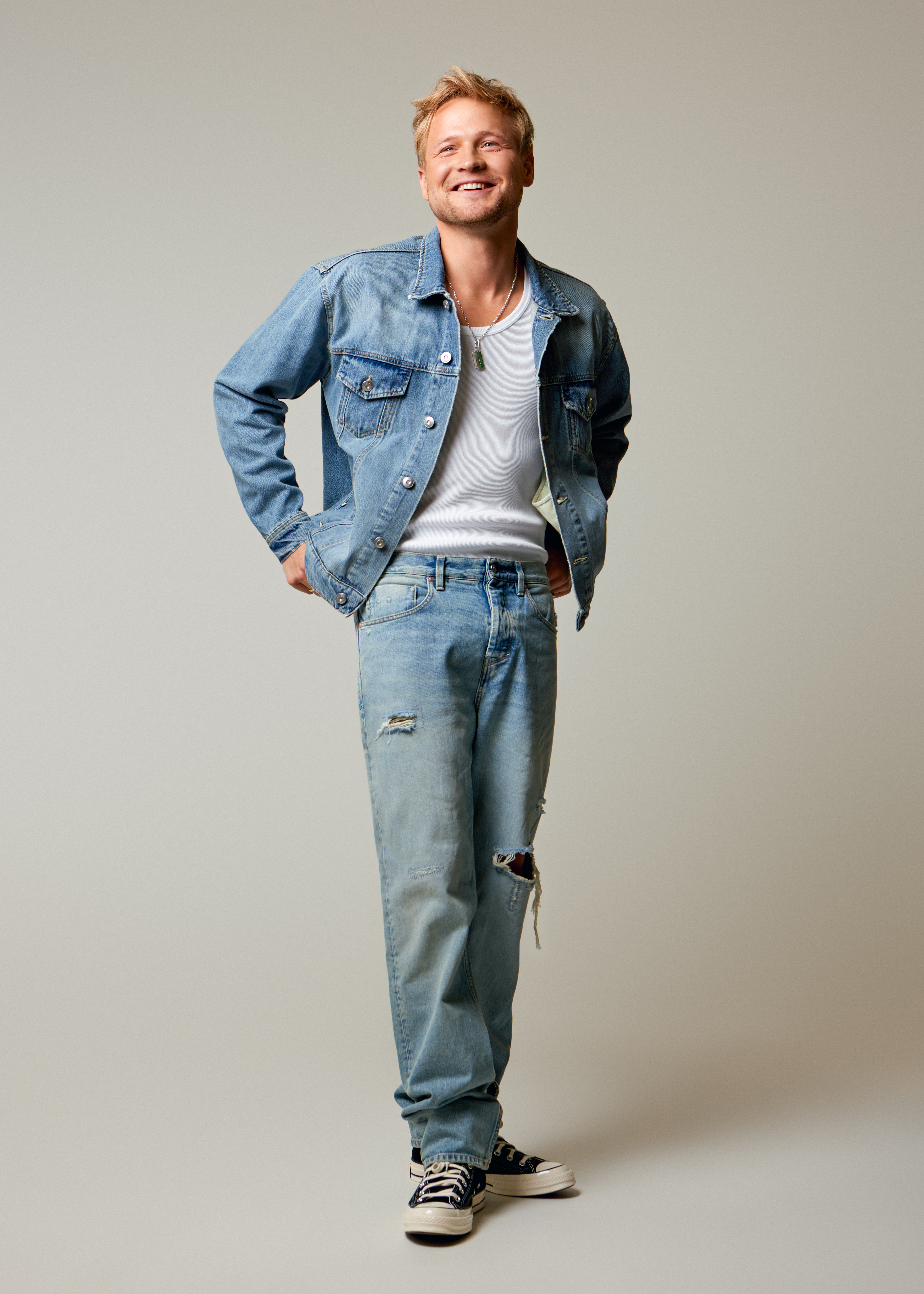 kalvijn in denim pak