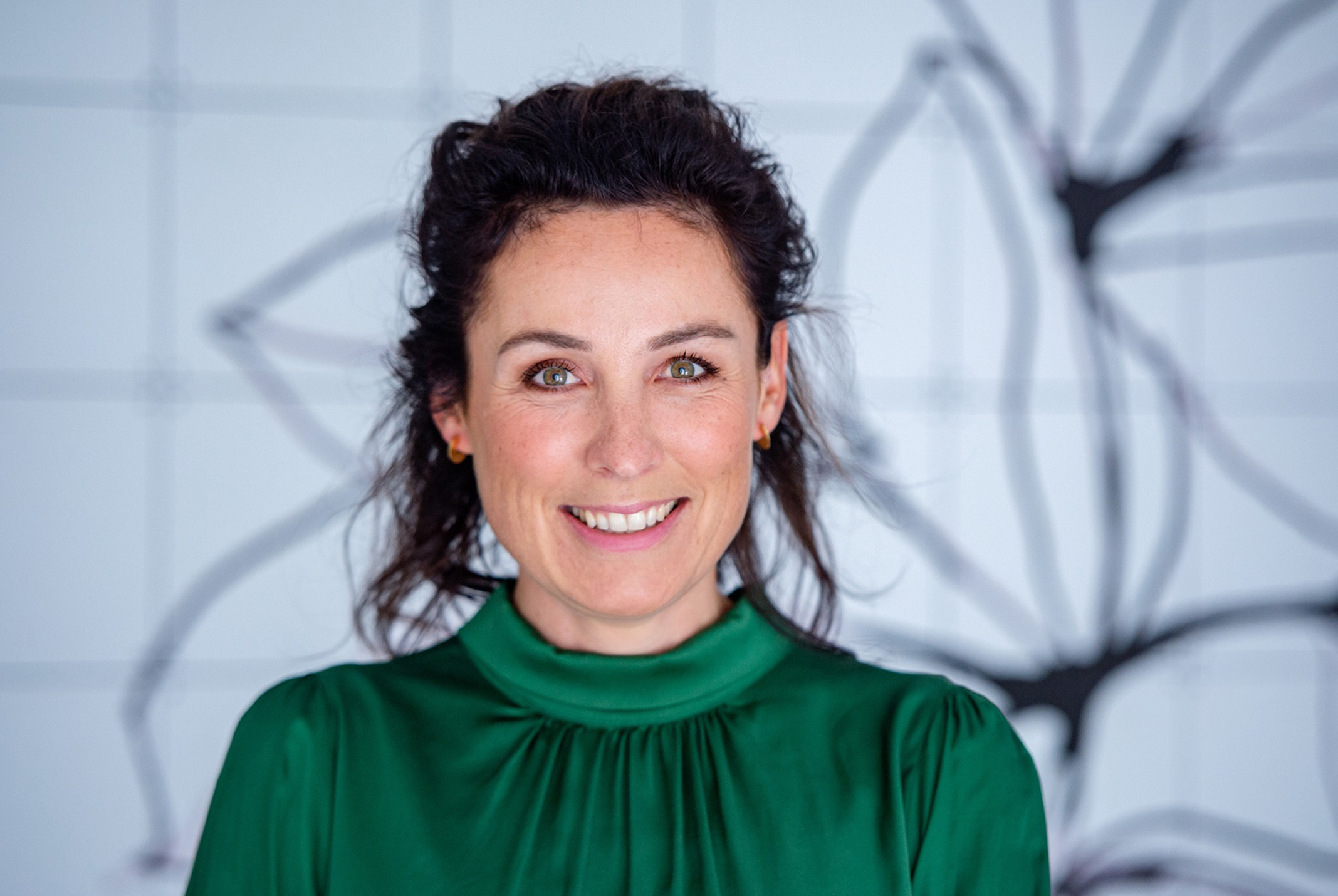 Marijn de Vries groene top en witte achtergrond