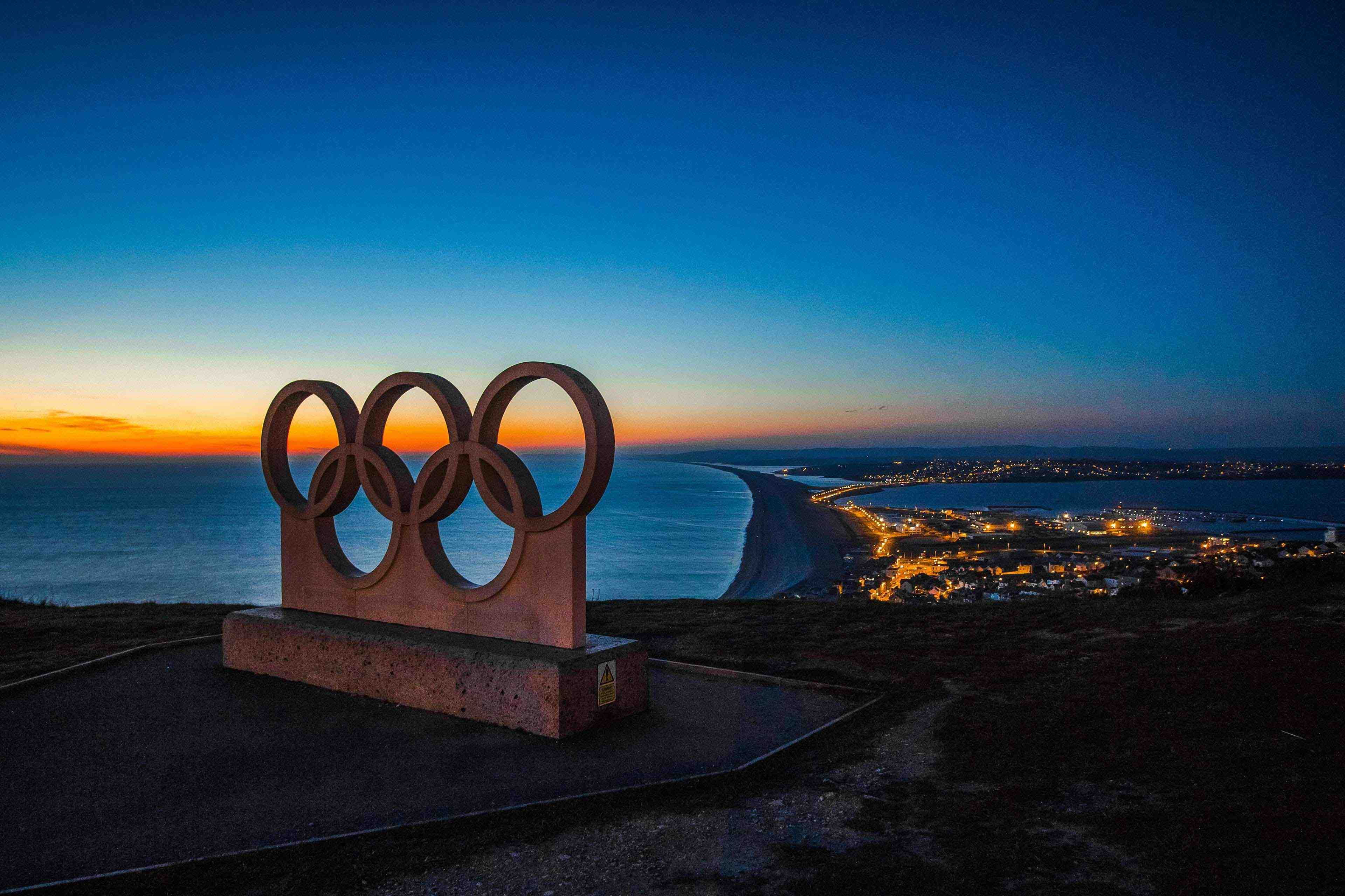 olympische spelen logo met zonsondergang